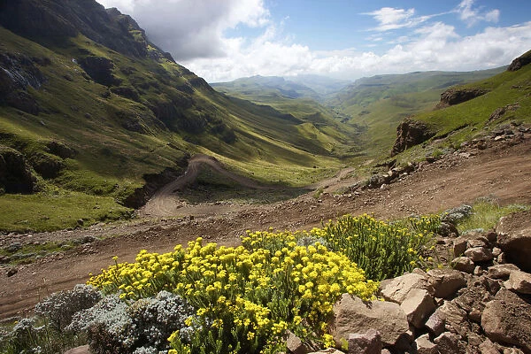 A scenic view of rolling hills of the Sani Pass, Drakensberg Park, KwaZulu-Natal, South Africa