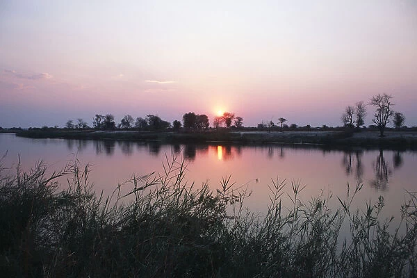 Scenic View of a Sunset Over a River
