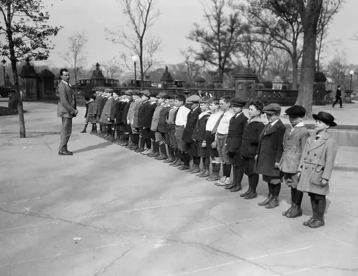 Framed Print : School boys (10-12 years) standing in line in park. New York City, New York State, USA. May 03, 1922 Framed Print : School boys (10-12 years) standing in line in park. New York City, New York State, USA. May 03, 1922