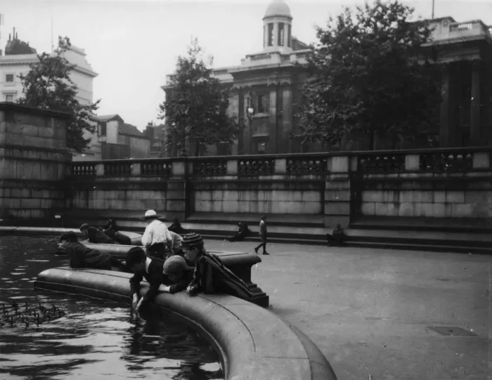 Framed Print : Boys. circa 1900: Schoolboys playing in Trafalgar Square, around 1900