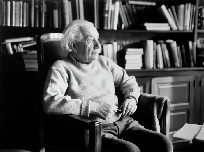 Framed Print : Scientist Albert Einstein in Library Framed Print : Scientist Albert Einstein in Library