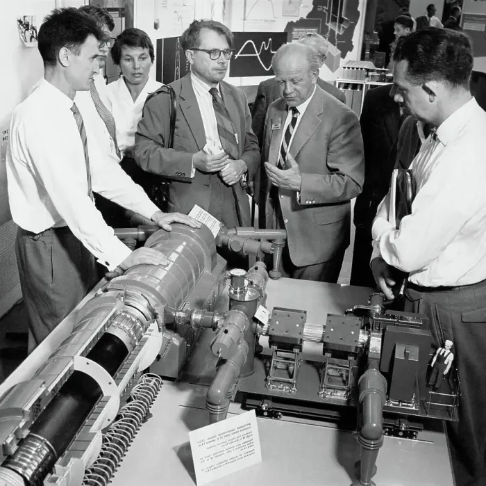 Framed Print : Scientist at Atomic Energy Conference Exhibit