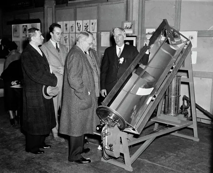 Framed Print : Scientist Demonstrates Solar Energy Machine Framed Print : Scientist Demonstrates Solar Energy Machine