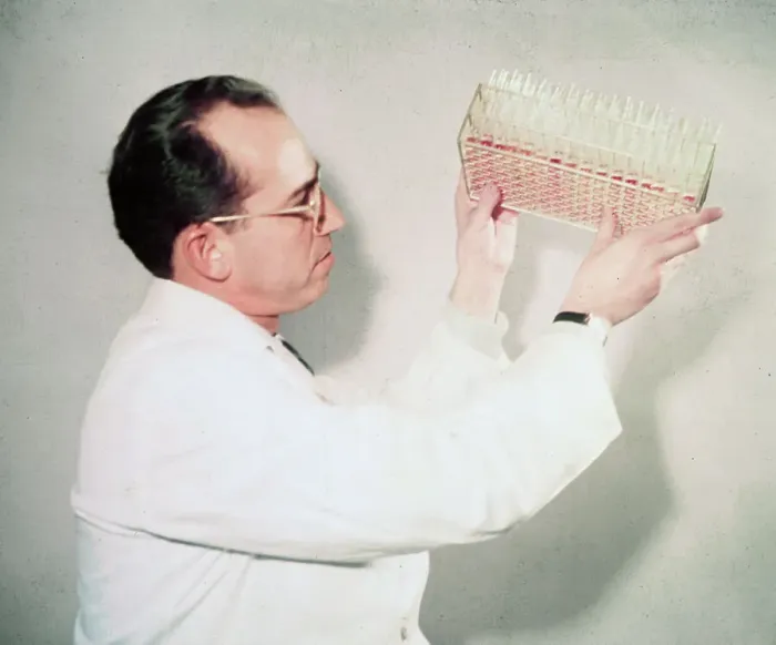 Framed Print : Scientist Jonas Salk Examining Vials Framed Print : Scientist Jonas Salk Examining Vials