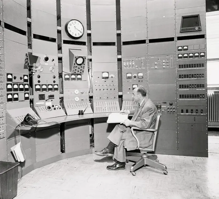 Framed Print : Scientist Sitting in Atomic Control Room Framed Print : Scientist Sitting in Atomic Control Room