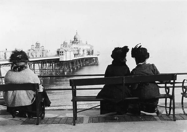 Down By The Sea. circa 1900: People by the sea at Eastbourne