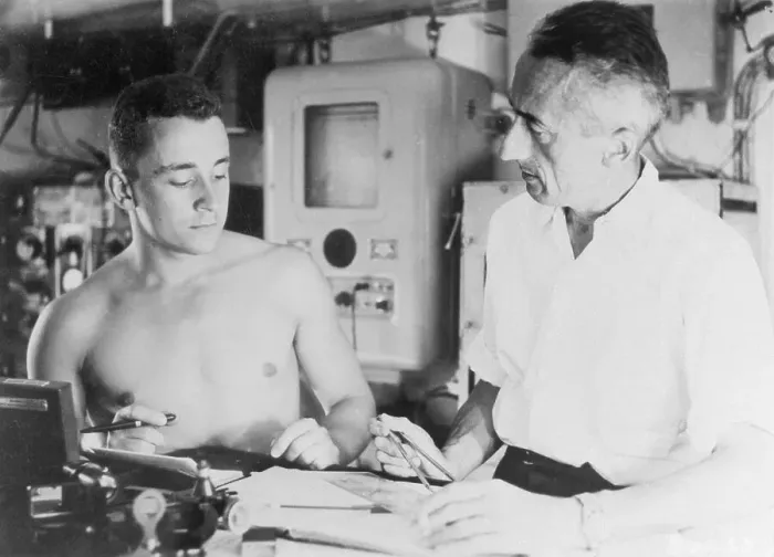 Framed Print : Sea Explorer Jacques Cousteau and Crew Member Making Plans Framed Print : Sea Explorer Jacques Cousteau and Crew Member Making Plans