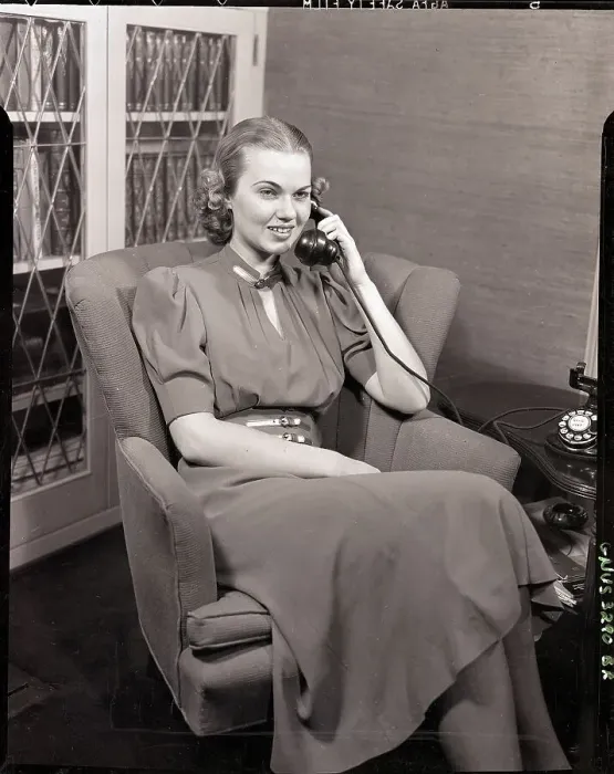 Framed Print : Seated Woman Talking in Telephone Framed Print : Seated Woman Talking in Telephone