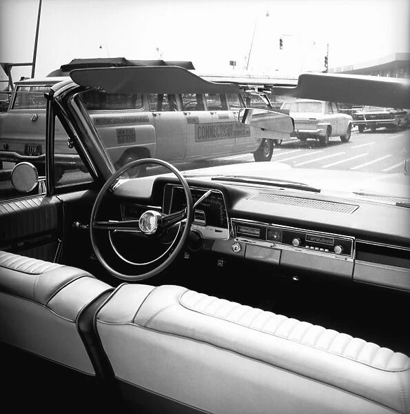 Front seats of convertible car, (B&W)
