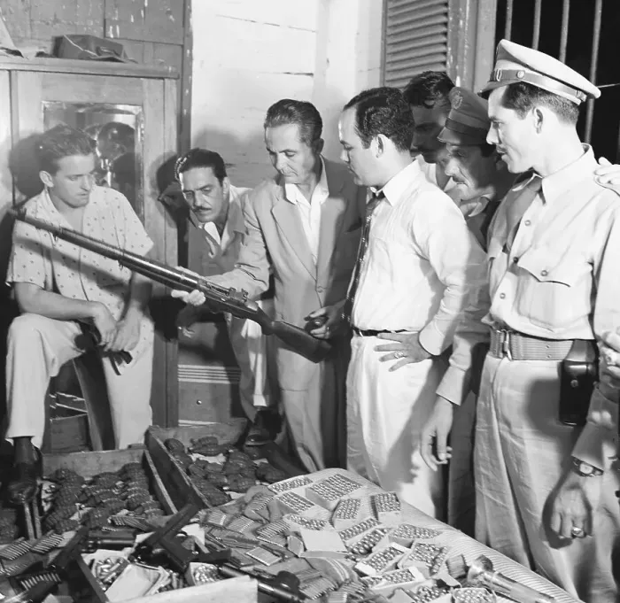 Framed Print : Secret Service Men Examining Weapons Framed Print : Secret Service Men Examining Weapons