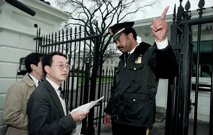 Framed Print : Secret Service Officer Giving Directions