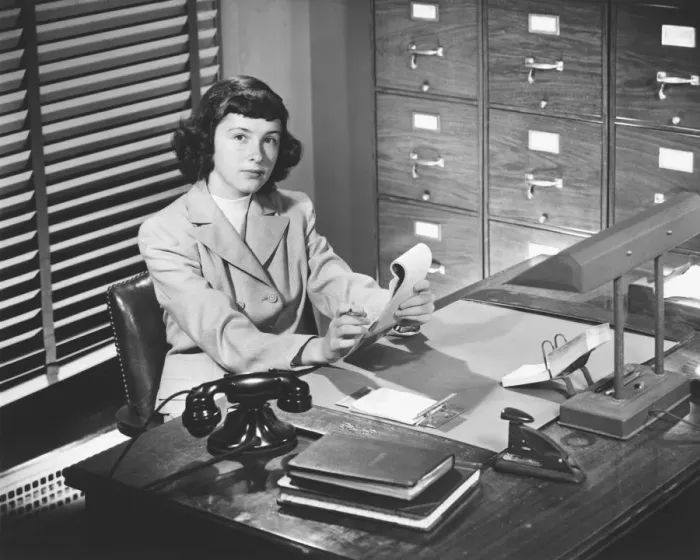 Framed Print : Secretary working in office, (B&W) Framed Print : Secretary working in office, (B&W)