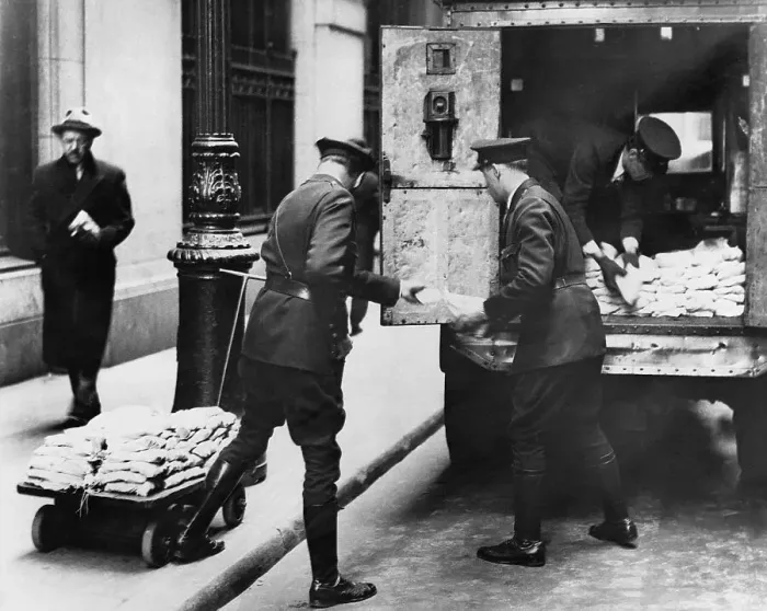 Framed Print : Security Guards Unloading Gold Coins