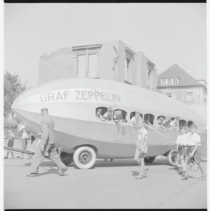 Framed Print : Seehasen Parade with Youngsters in and Towing Zeppelin Float Framed Print : Seehasen Parade with Youngsters in and Towing Zeppelin Float