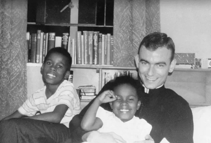 Framed Print : Seminarian Jonathan Daniels with Two Children