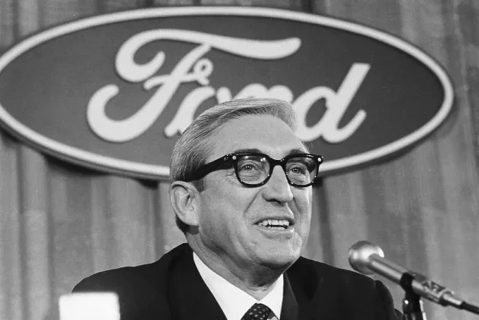 Framed Print : Semon E. Knudsen Sitting Under Ford Logo Framed Print : Semon E. Knudsen Sitting Under Ford Logo