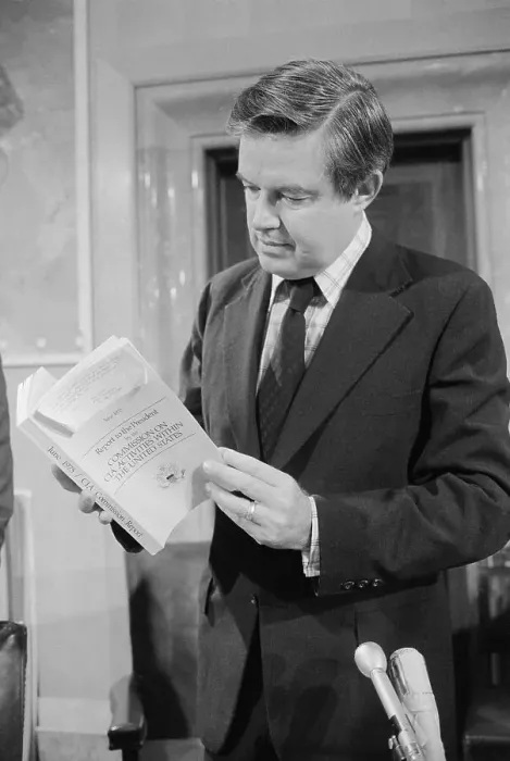 Framed Print : Senator Frank Church Holding a Book