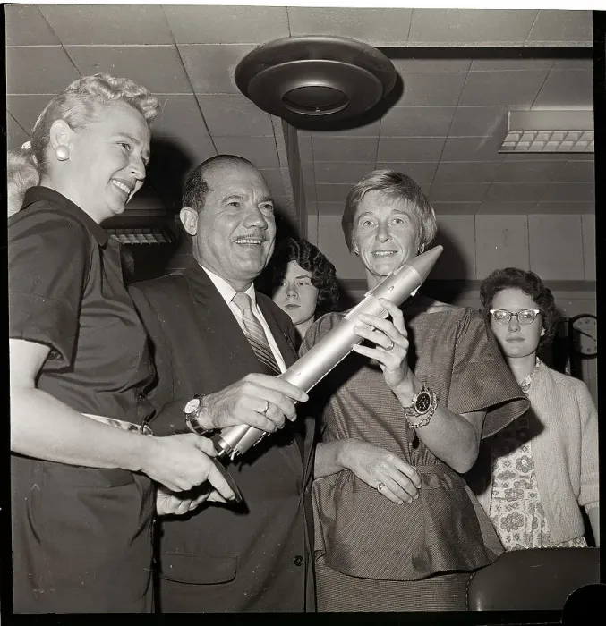 Framed Print : Senator and two Women Holding Missile Model Framed Print : Senator and two Women Holding Missile Model