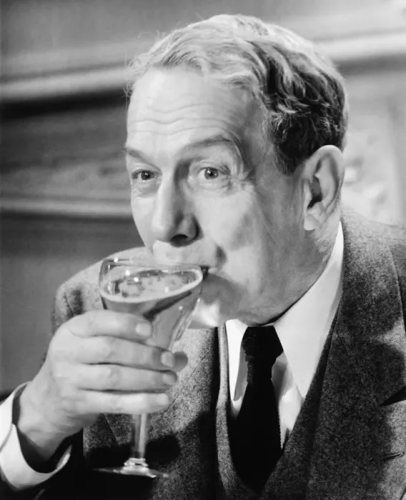 Framed Print : Senior drinking from glass (B&W) Framed Print : Senior drinking from glass (B&W)