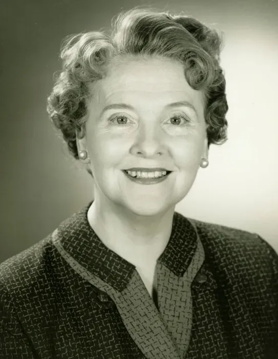 Framed Print : Senior woman smiling in studio, (B&W), close-up, portrait Framed Print : Senior woman smiling in studio, (B&W), close-up, portrait