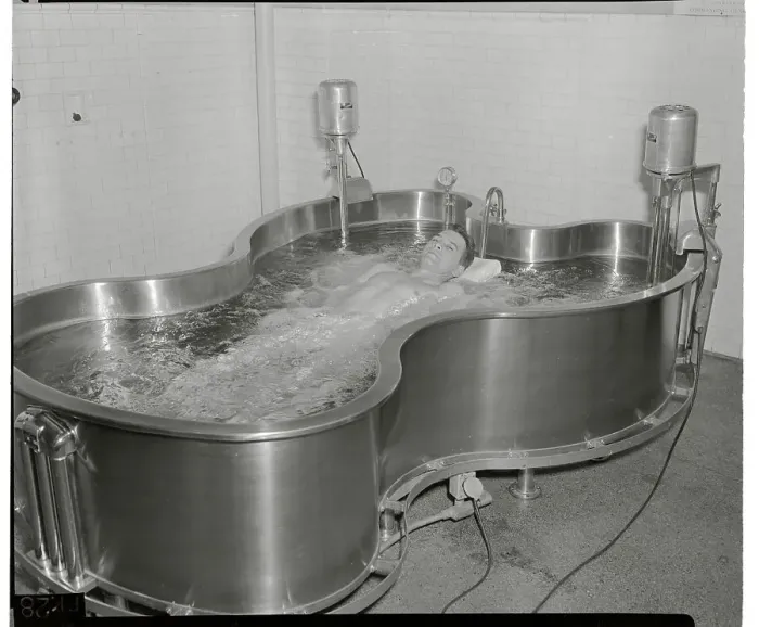 Framed Print : Sergeant Reclining in Army Bath Tank for Polio Treatment Framed Print : Sergeant Reclining in Army Bath Tank for Polio Treatment