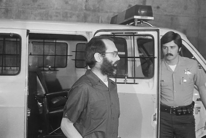 Framed Print : Serial Killer Arrives at Court Framed Print : Serial Killer Arrives at Court