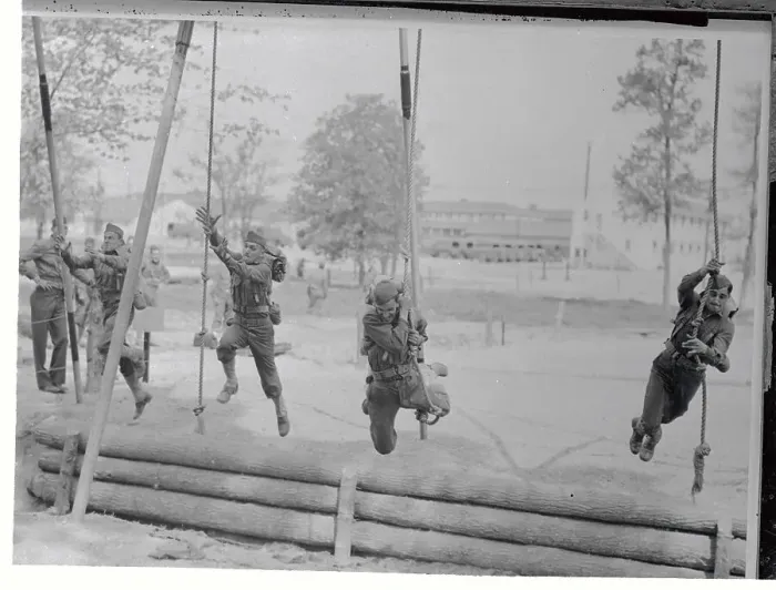 Framed Print : Servicemen Training on Obstacle Course