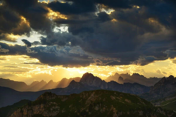 Setting sun rays over Dolomites