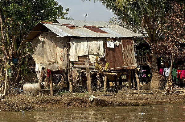Shack, corrugated iron hut at the Sangker River, near Battambang, Battambang Province, Cambodia