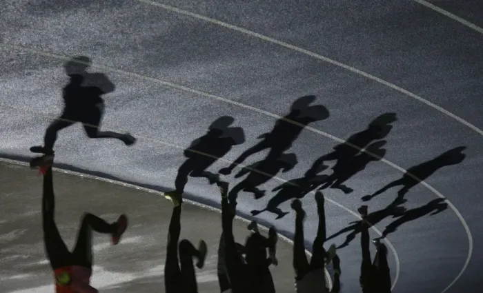 Framed Print : Shadows of a group of runners Framed Print : Shadows of a group of runners
