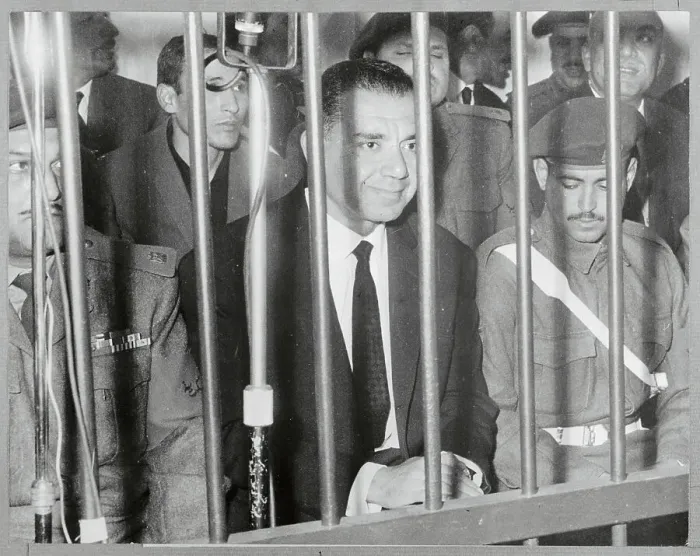 Framed Print : Shams Badran Standing Behind Bars Framed Print : Shams Badran Standing Behind Bars