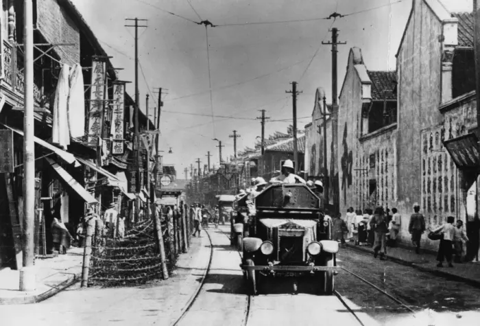Framed Print : Shanghai. circa 1935: A British armoured car patrolling the streets of Framed Print : Shanghai. circa 1935: A British armoured car patrolling the streets of