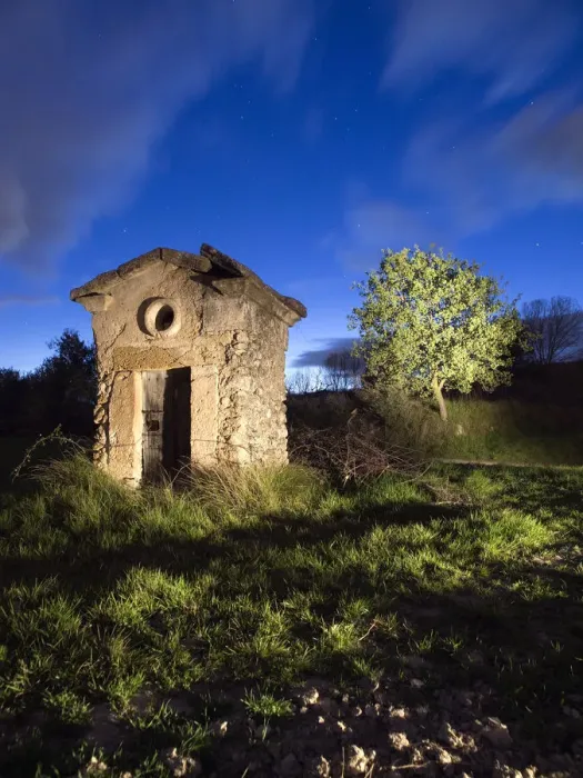 Framed Print : Shed of ancient stone of a well at dusk Framed Print : Shed of ancient stone of a well at dusk