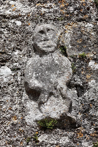 Sheela-na-Gig on the church wall of Killinaboy, Burren, County Clare, Ireland, Europe