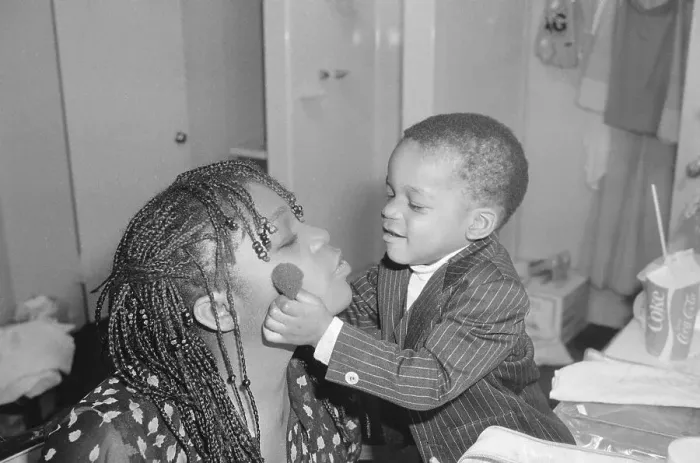 Framed Print : Sheila Ellis Getting Her Makeup Applied by Son Framed Print : Sheila Ellis Getting Her Makeup Applied by Son