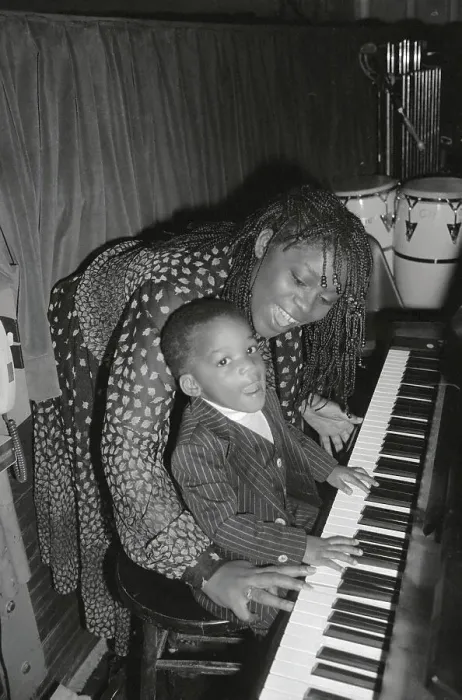 Framed Print : Sheila Ellis with Son Playing Piano and Singing Framed Print : Sheila Ellis with Son Playing Piano and Singing
