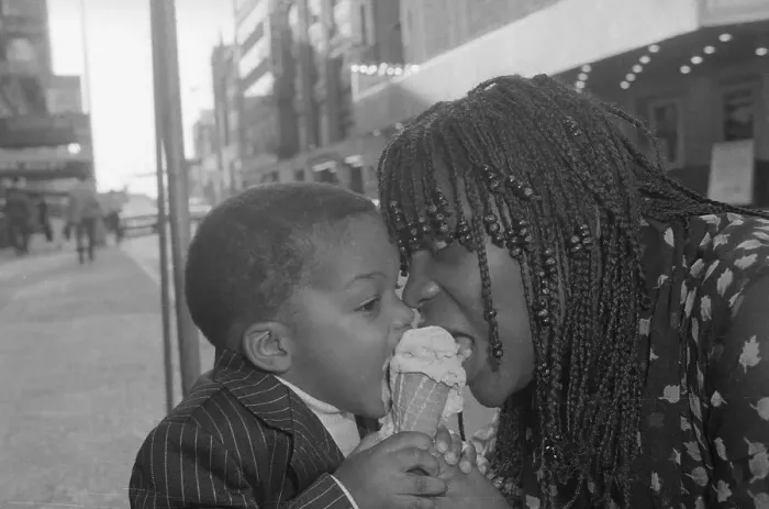 Framed Print : Sheila Ellis and Son Sharing Ice Cream Cone Framed Print : Sheila Ellis and Son Sharing Ice Cream Cone