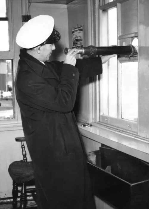 Framed Print : Ship Ahoy. circa 1930: A river pilot uses a telescope to keep watch for ships Framed Print : Ship Ahoy. circa 1930: A river pilot uses a telescope to keep watch for ships