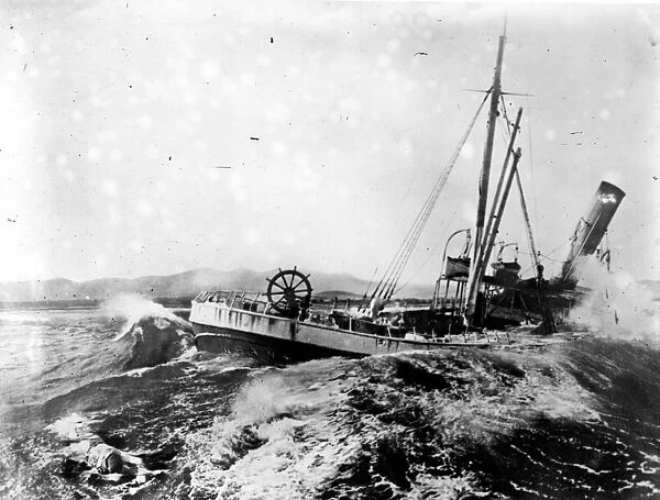 Shipwreck. circa 1911: A shipwreck floating on the waters