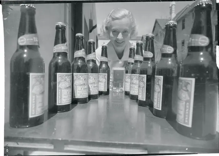 Framed Print : Shirley Grey Posing with Beer Bottles Framed Print : Shirley Grey Posing with Beer Bottles