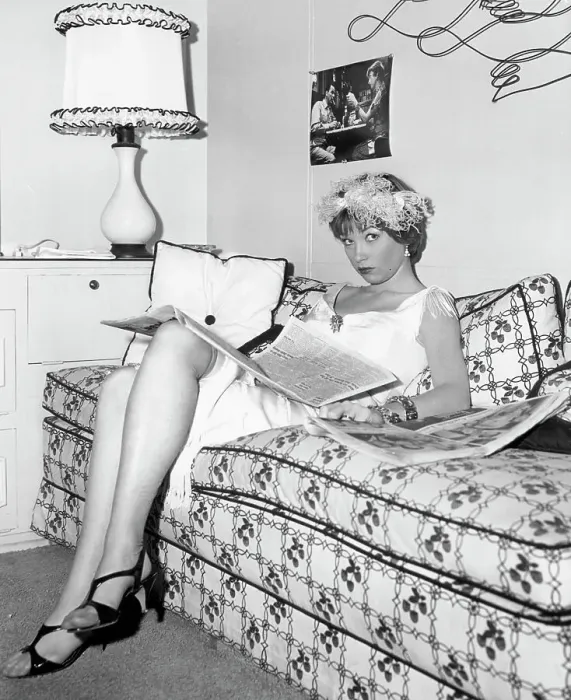 Framed Print : Shirley Maclaine Reads The Newspaper Framed Print : Shirley Maclaine Reads The Newspaper