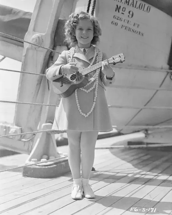 Framed Print : Shirley Temple Playing a Guitar Framed Print : Shirley Temple Playing a Guitar