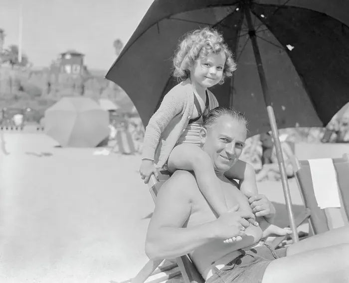 Framed Print : Shirley Temple Sitting on Fathers Shoulders Framed Print : Shirley Temple Sitting on Fathers Shoulders