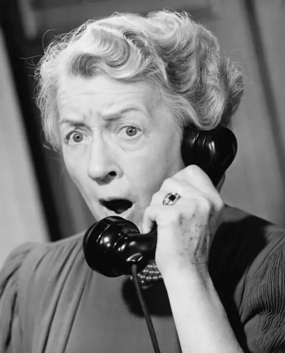 Framed Print : Shocked woman using phone, (B&W), close-up Framed Print : Shocked woman using phone, (B&W), close-up