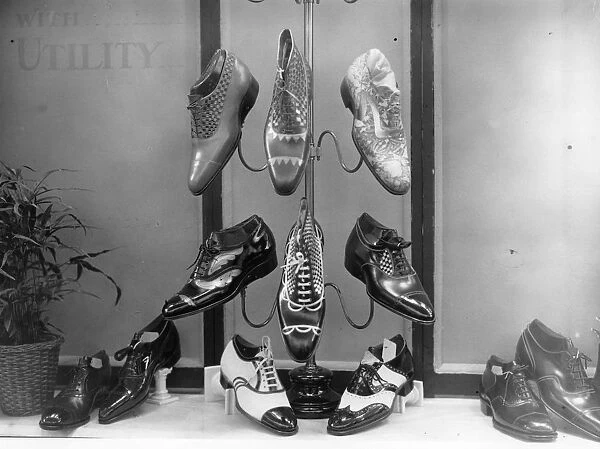 Shoe Show. 5th October 1925: A selection of mens shoes on sale at the International Shoe