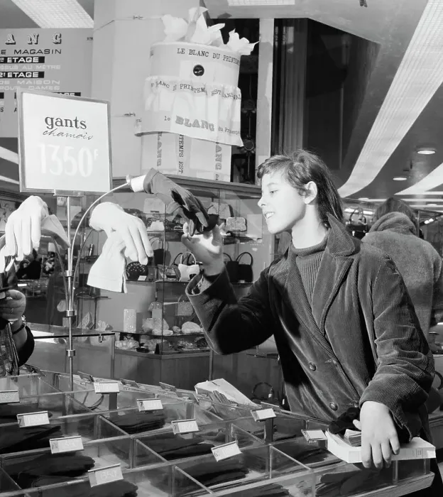 Framed Print : Shopper Looking at Gloves Near Hidden Security Camera Framed Print : Shopper Looking at Gloves Near Hidden Security Camera