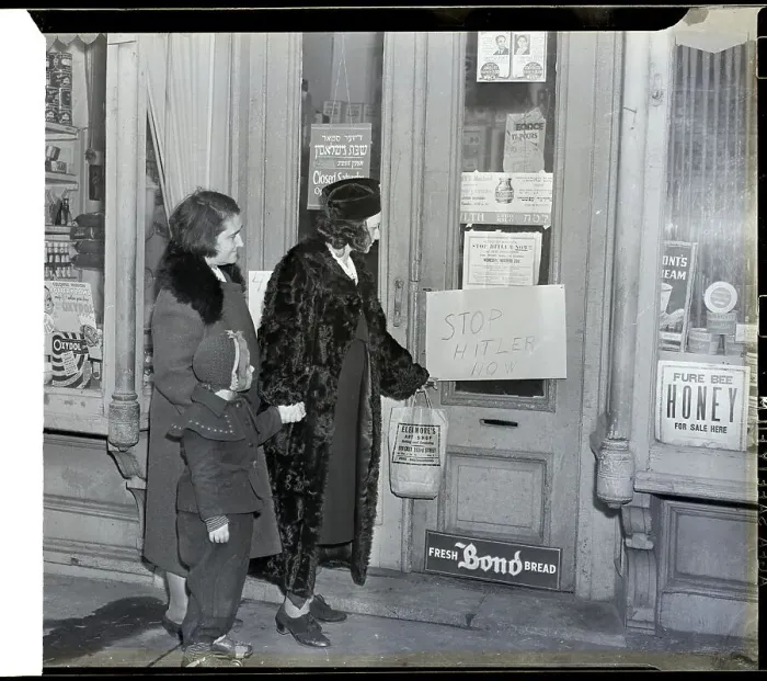 Framed Print : Shoppers Look At Sign On Door Framed Print : Shoppers Look At Sign On Door