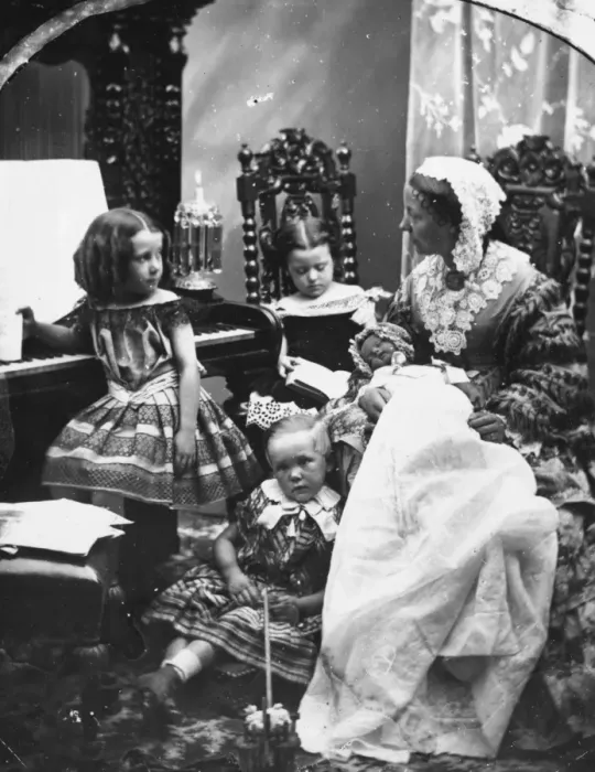 Framed Print : Siblings. Mother and children in the parlour Framed Print : Siblings. Mother and children in the parlour
