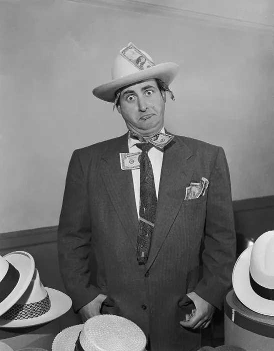 Framed Print : Sid Caesar Surrounded by Hats Framed Print : Sid Caesar Surrounded by Hats