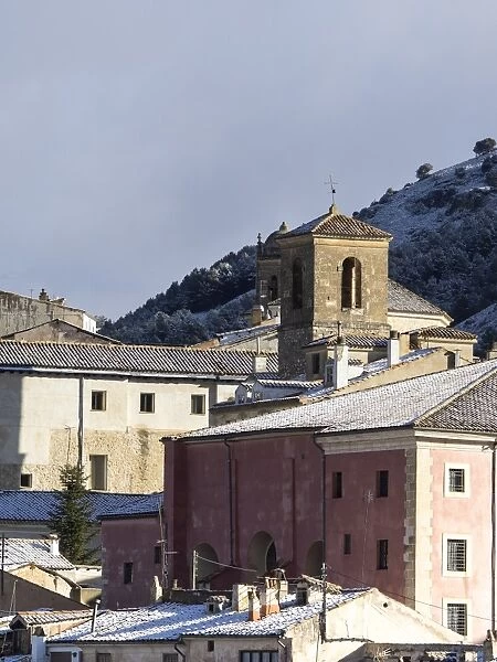 Sight of the old town of basin with the covered with snow roofs